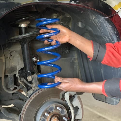 Coil spring fitment